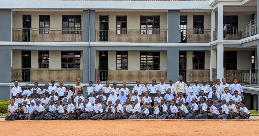 NiCosta students and staff in front of the school